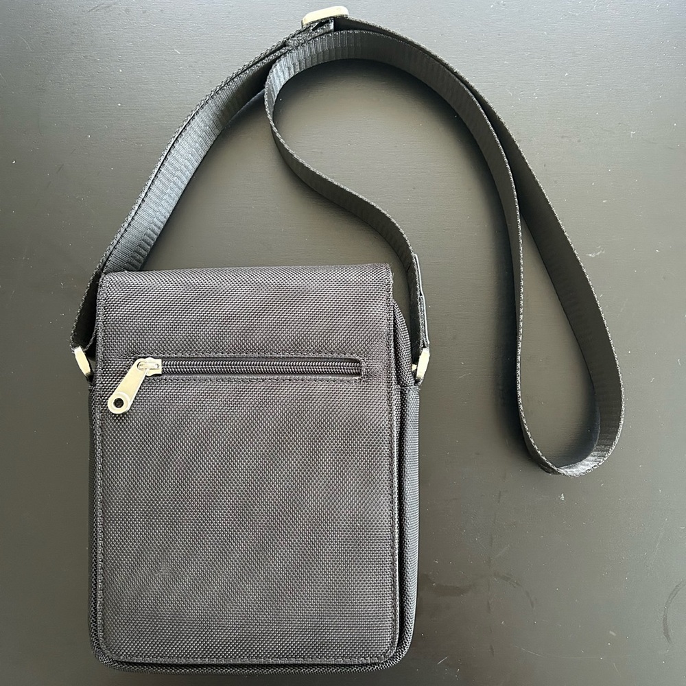 Shoulder bag, satchel. Black. Like new. Looks good for dressing up.